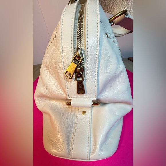 Yves Saint Laurent Black and Gold Interior - Picture 4 of 15